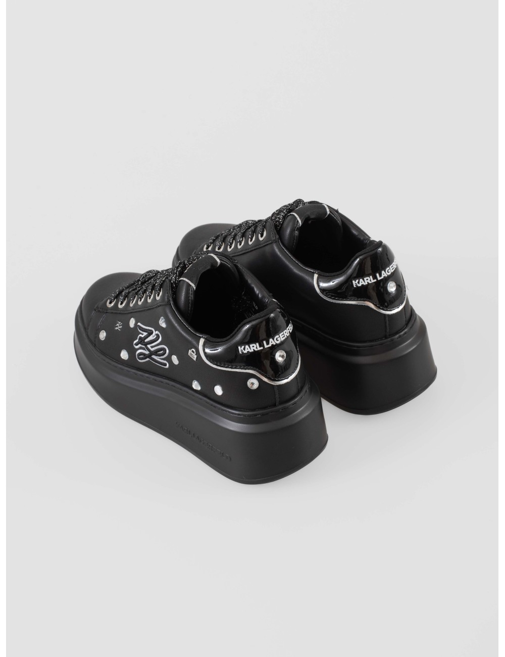 Estas zapatillas de plataforma combinan la elegancia atemporal de Karl Lagerfeld con un toque moderno y atrevido - MARFRANC Estas zapatillas de plataforma combinan la elegancia atemporal de Karl Lagerfeld con un toque moderno y atrevido - MARFRANC