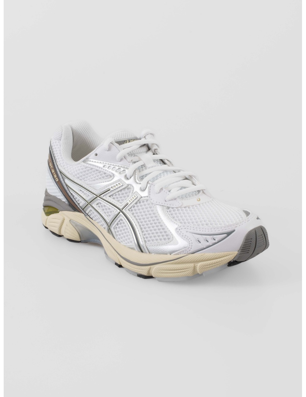 Zapatillas ASICS GT-2160 hombre color White Soft Yellow con amortiguación GEL y diseño retro running disponibles en MARFRANC