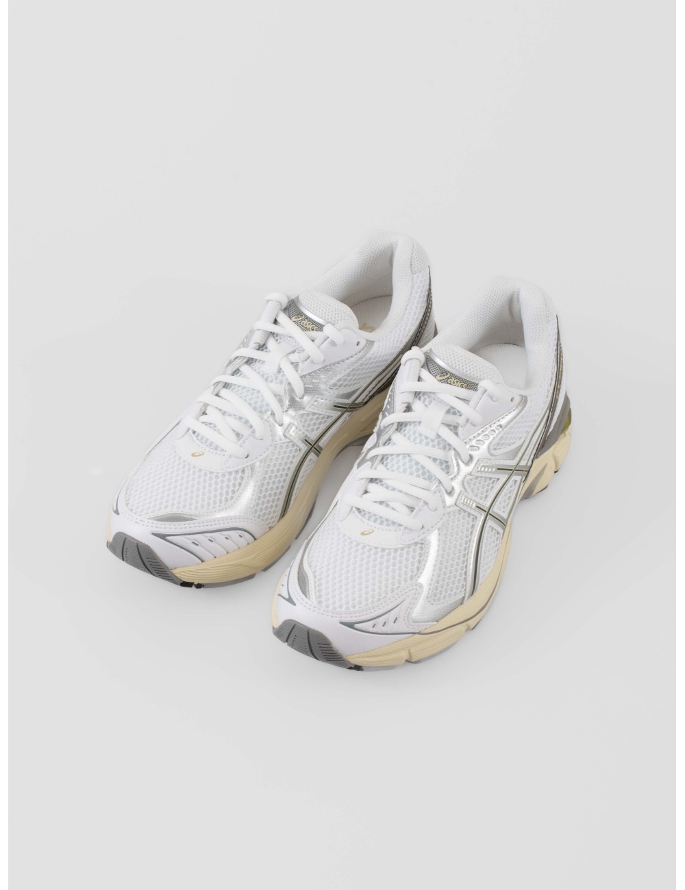 Zapatillas ASICS GT-2160 hombre color White Soft Yellow con amortiguación GEL y diseño retro running disponibles en MARFRANC