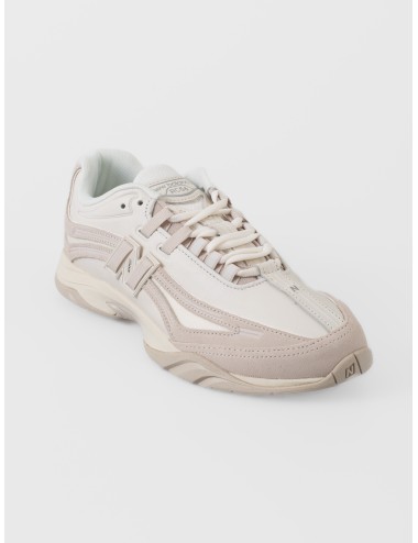 Sneaker timberwolf New Balance RC56 con paneles ondulados, logo N-Lock y base en tonos neutros