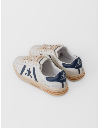 Zapatilla blanca y azul Premiata Russell 8028 con paneles en contraste y suela gráfica