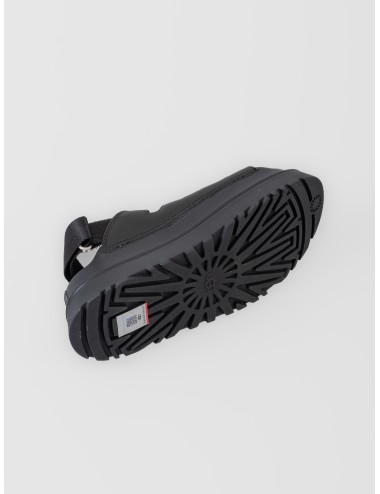 Sandalia negra UGG GoldenGlow Toggle con cordón ajustable, tira trasera y suela de plataforma