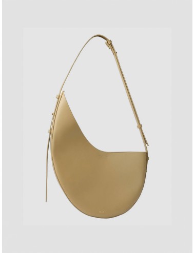 Bolso beige Soeur Paris Winona de piel lisa con forma asimétrica y correa ajustable.