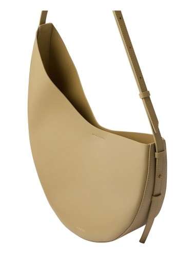 Bolso beige Soeur Paris Winona de piel lisa con forma asimétrica y correa ajustable.