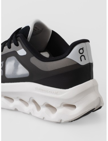 Zapatilla negra y marfil On Cloudtilt Remix con upper translúcido y suela de gran volumen