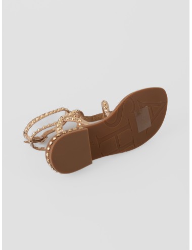 Sandalia plana dorada ASH Precious con tiras cruzadas, hebillas al tobillo y tachas metálicas