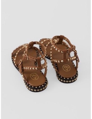 Sandalia plana marrón ASH Precious con tiras cruzadas, hebillas al tobillo y tachas doradas