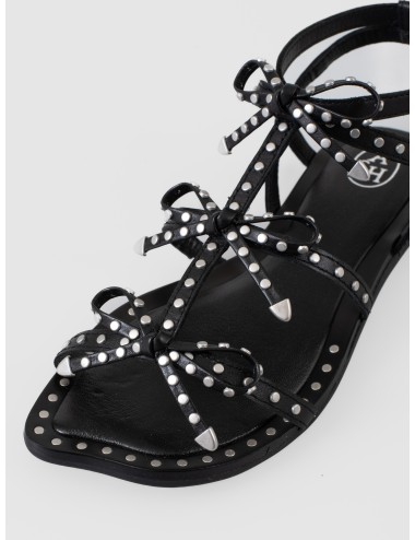 Sandalia plana negra ASH Gladius con tiras finas, lazos decorativos y aplicaciones metálicas