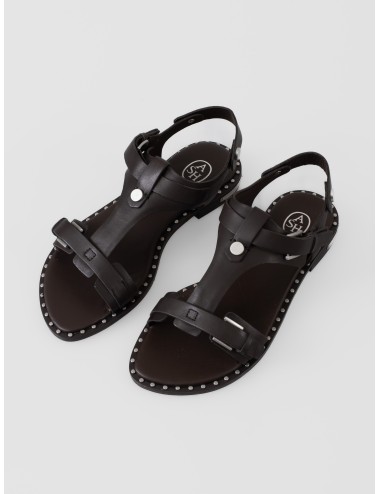 Sandalia plana oscura ASH Piper con tira en T, hebillas metálicas y tachas plateadas