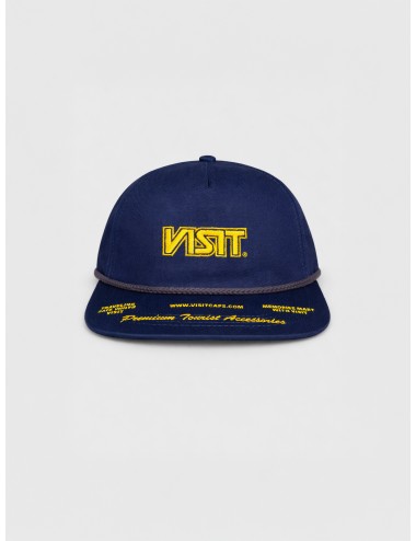 Gorra navy VISIT Guide 001 con bordado frontal amarillo, visera plana y cordón frontal