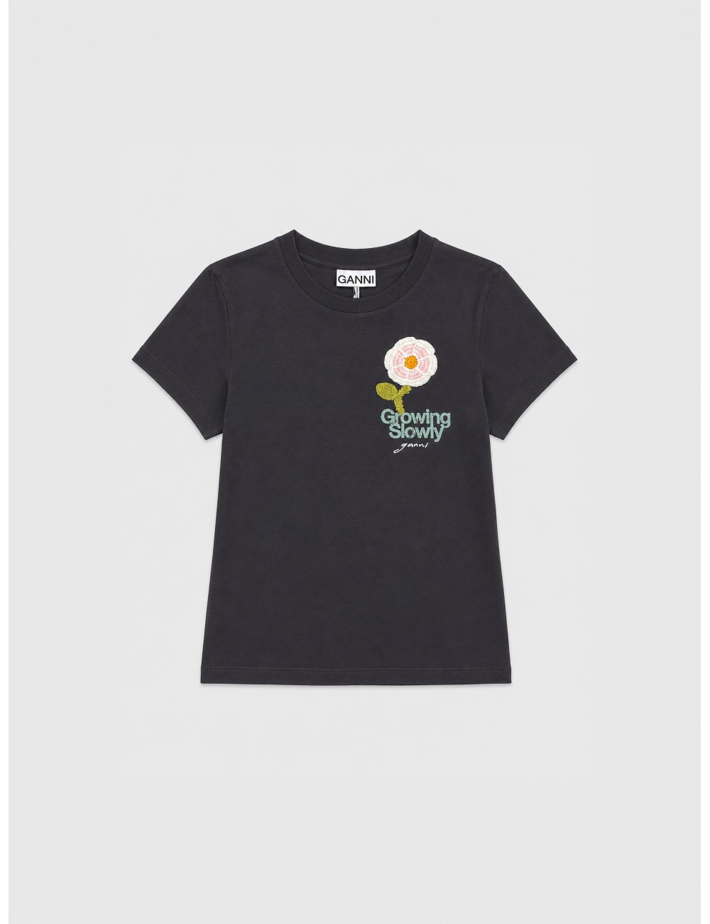 Camiseta negra GANNI con flor de crochet y gráfico frontal