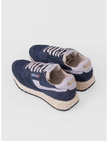 sneakers blanco y gris Autry Reelwind Low Man con paneles runner y suela de agarre detalle de suela