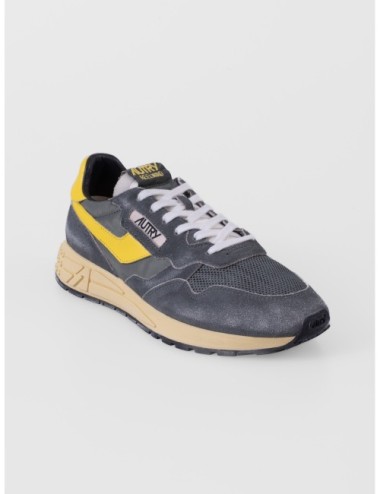 sneakers verde profundo y amarillo Autry Reelwind Low Man con paneles runner y suela de agarre vista lateral