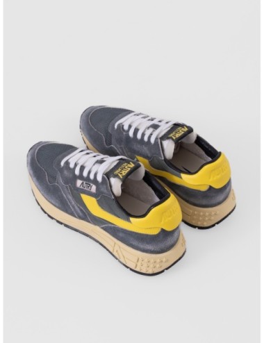 sneakers verde profundo y amarillo Autry Reelwind Low Man con paneles runner y suela de agarre detalle de suela