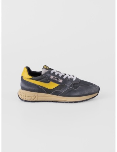 sneakers verde profundo y amarillo Autry Reelwind Low Man con paneles runner y suela de agarre vista frontal