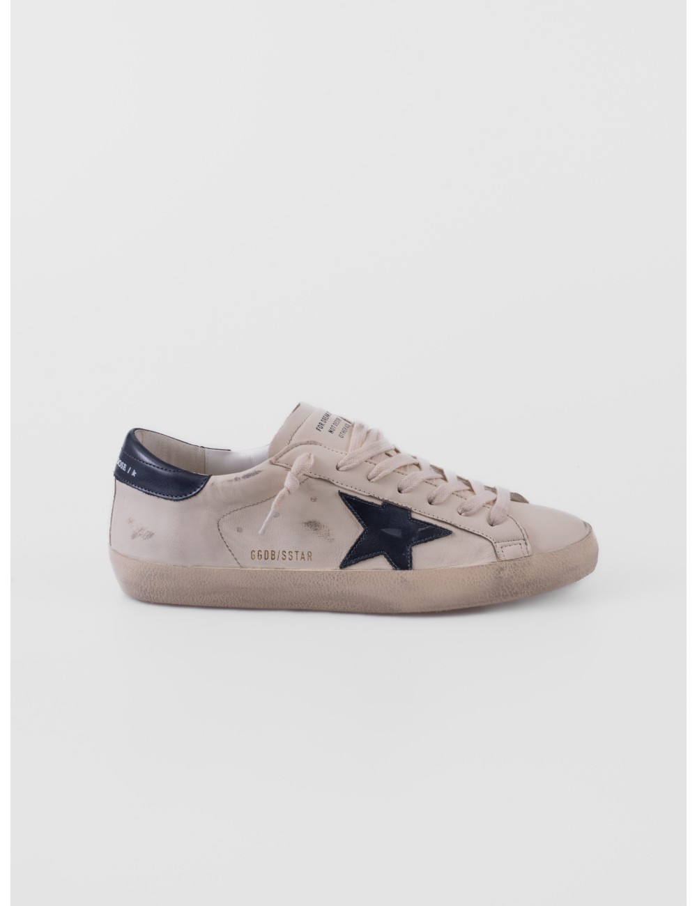 zapatillas Super Star Golden Goose beige y azul marino vista lateral exterior