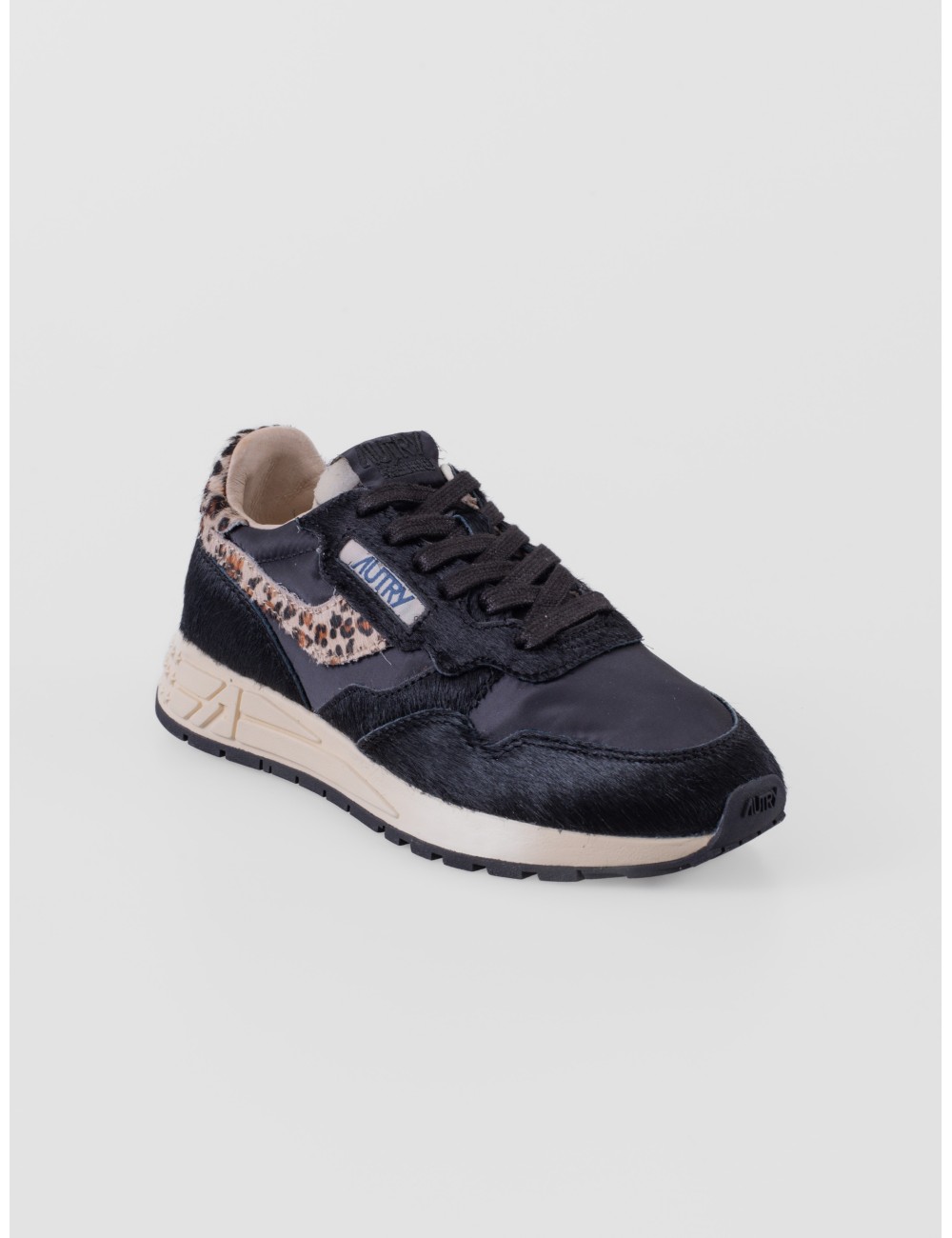 Sneakers Reelwind Low de Autry en negro y leopardo