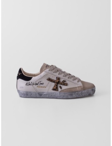 Sneakers Stevend 7605 de Premiata en blanco crema negro y dorado