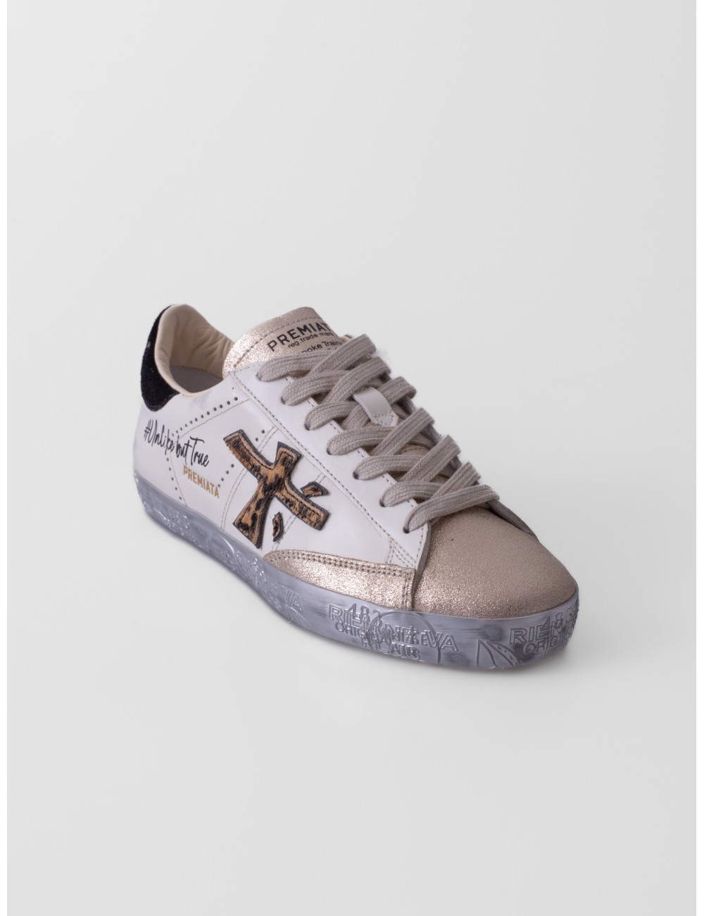 Sneakers Stevend 7605 de Premiata en blanco crema negro y dorado