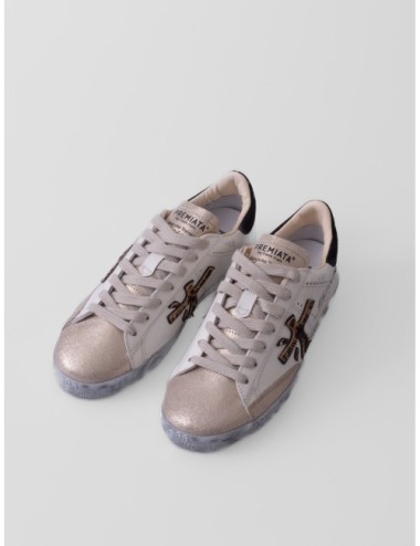 Sneakers Stevend 7605 de Premiata en blanco crema negro y dorado
