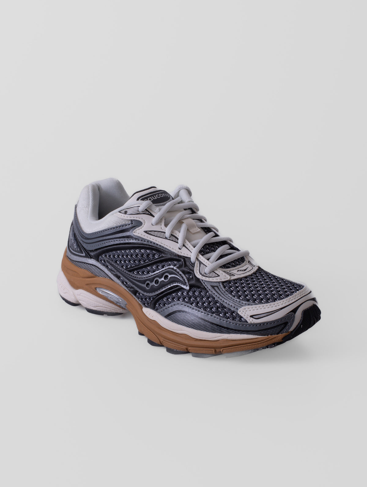 Zapatillas Saucony ProGrid Omni 9 Tech Premium en color GUNMETAL/CIDER, con detalles de su diseño y construcción