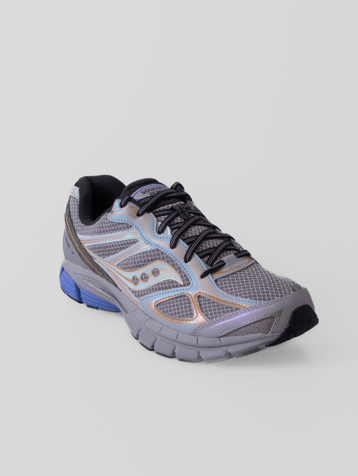 Zapatillas Saucony Daikanyama ProGrid Guide 7 en color OWL/AUREATE, con detalles de su diseño y construcción