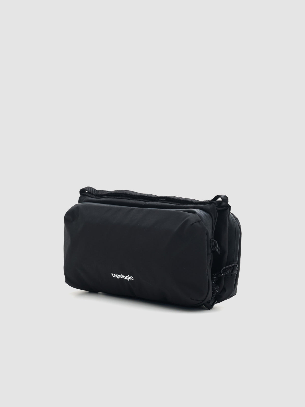 Bolso Topologie Bottle Sacoche Medium en Black / Papery